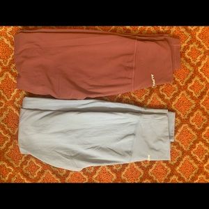 TWO PAIRS OF SURFACE PATH ALPHALETE LEGGINGS